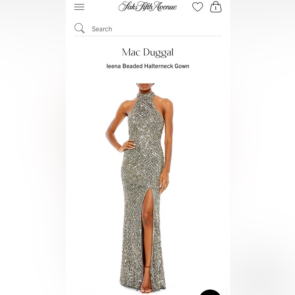 Gorgeous sequin halter neck gown with an open back and thigh high slit.